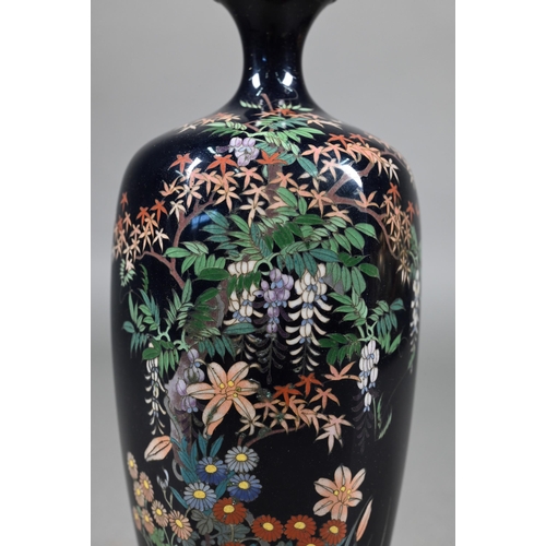 387 - A mirrored pair of late 19th century Japanese cloisonne vases, Meijji period (1868-1912) dark purple... 