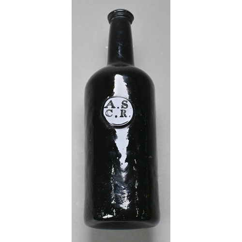 423 - An antique brown glass bottle with 'ASCR' seal - All Souls Common Room (Oxford), 28 cm high