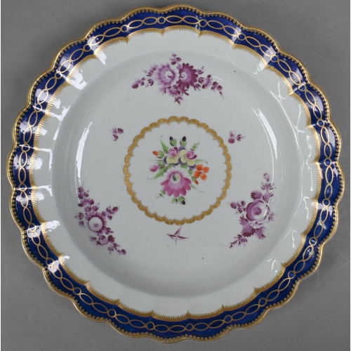 508 - A First Period Worcester 23 cm plate with polychrome painted floral sprays, to/w a dish with polychr... 