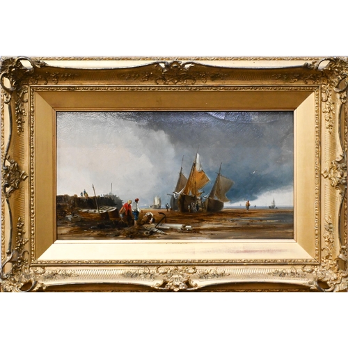 675 - E J Niemann (1813-1876) - Fishing vessels at low tide, oil on panel, signed lower left, 21 x 38.5 cm