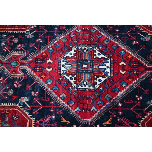 764 - A contemporary North West Persian Nahawand rug, centred by a red ground medallion, 230 cm x 135 cm