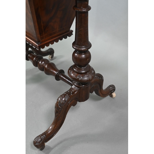 815 - A Victorian walnut veneered work table, the quarter veneered hinged top enclosing a fitted interior ... 