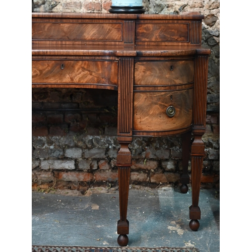 822 - A George III figured mahogany stage-back sideboard, the superstructure with two sliding door compart... 