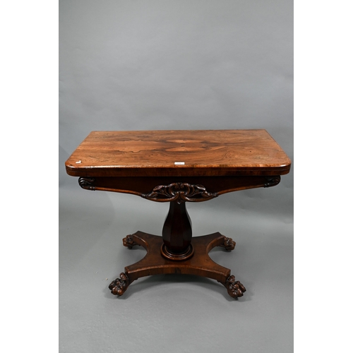 838 - A Victorian rosewood card table, the revolving fold over top with green baize lining, raised on a mu... 