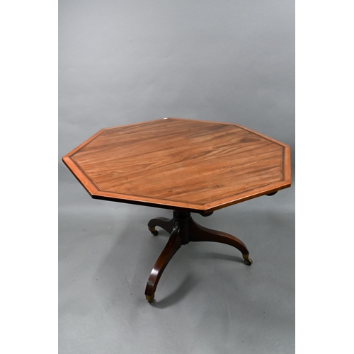 866 - A George III cross-banded mahogany breakfast table, the octagonal tilt-top raised on a gun-barrel su... 