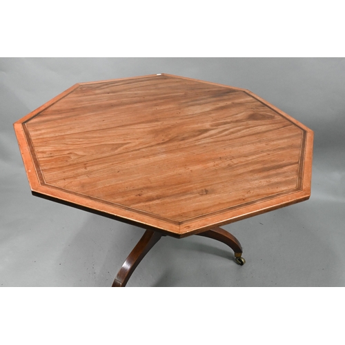 866 - A George III cross-banded mahogany breakfast table, the octagonal tilt-top raised on a gun-barrel su... 