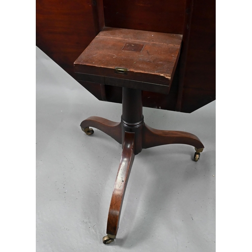 866 - A George III cross-banded mahogany breakfast table, the octagonal tilt-top raised on a gun-barrel su... 