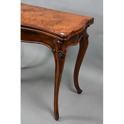 890 - A Victorian burr walnut card table, the serpentine fold over top raised on rose hip carved hip carve... 