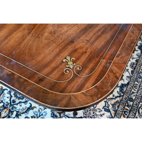 891 - A Regency brass fleur-de-lys inlaid mahogany breakfast table, raised on a turned tulip form support ... 