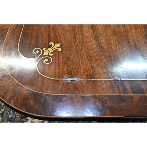 891 - A Regency brass fleur-de-lys inlaid mahogany breakfast table, raised on a turned tulip form support ... 