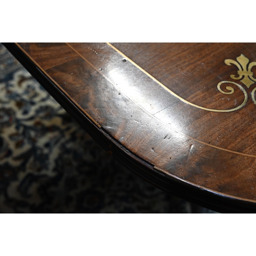 891 - A Regency brass fleur-de-lys inlaid mahogany breakfast table, raised on a turned tulip form support ... 