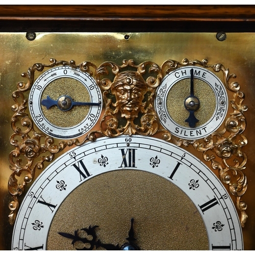 922 - An Edwardian oak bracket clock and bracket, the 8-day two train W & H Son movement striking the ... 