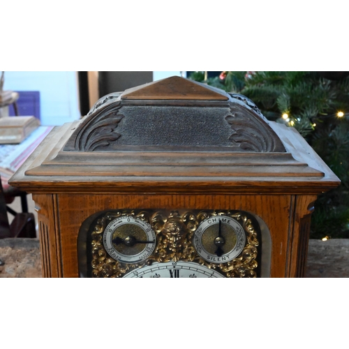 922 - An Edwardian oak bracket clock and bracket, the 8-day two train W & H Son movement striking the ... 