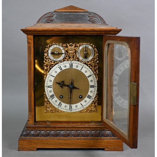 922 - An Edwardian oak bracket clock and bracket, the 8-day two train W & H Son movement striking the ... 