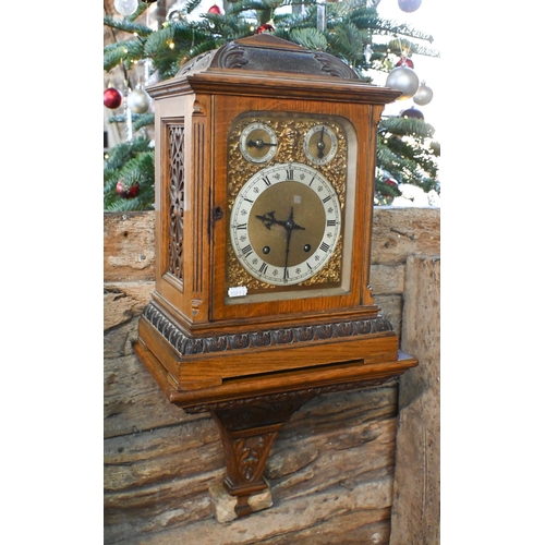 922 - An Edwardian oak bracket clock and bracket, the 8-day two train W & H Son movement striking the ... 