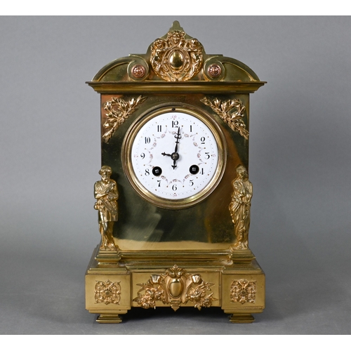 926 - An architectural form brass cased mantel clock, the white enamelled dial decorated with floral garla... 