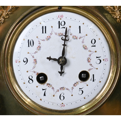 926 - An architectural form brass cased mantel clock, the white enamelled dial decorated with floral garla... 