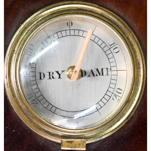 927 - Simpson, Southampton, a Victorian mahogany wheel barometer, with engraved silvered dial, thermometer... 