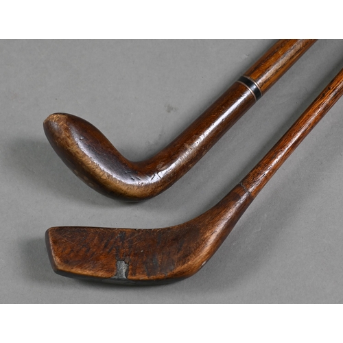 1081 - Two vintage hickory-shafted golf putters/walking sticks with lead-weighted heads and brass tips, 95/... 