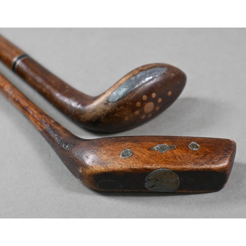 1081 - Two vintage hickory-shafted golf putters/walking sticks with lead-weighted heads and brass tips, 95/... 