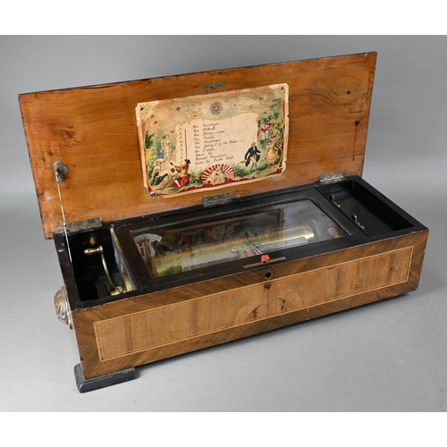 1089 - A 19th century Swiss inlaid walnut mechanical music box, the 28 cm cylinder playing ten airs, with c... 