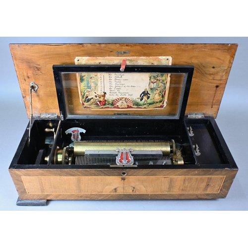 1089 - A 19th century Swiss inlaid walnut mechanical music box, the 28 cm cylinder playing ten airs, with c... 