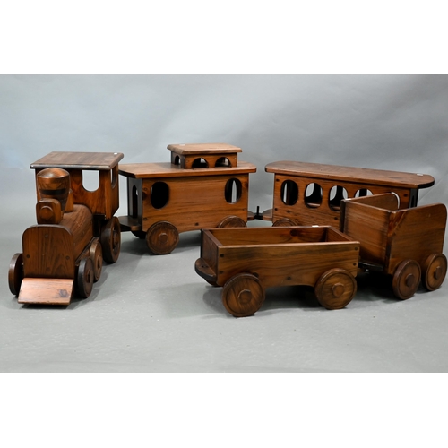 1096 - A large stained wood train set, comprising locomotive, tender, two carriages and an open wagon (poss... 