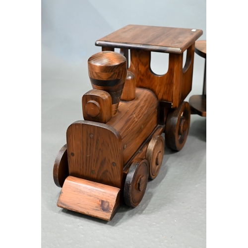 1096 - A large stained wood train set, comprising locomotive, tender, two carriages and an open wagon (poss... 