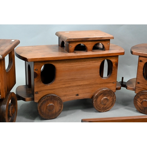 1096 - A large stained wood train set, comprising locomotive, tender, two carriages and an open wagon (poss... 