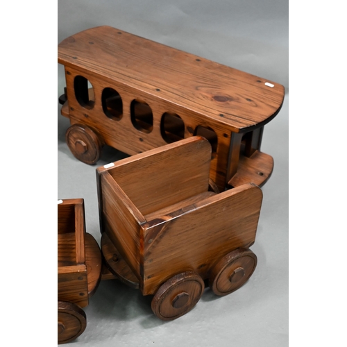 1096 - A large stained wood train set, comprising locomotive, tender, two carriages and an open wagon (poss... 