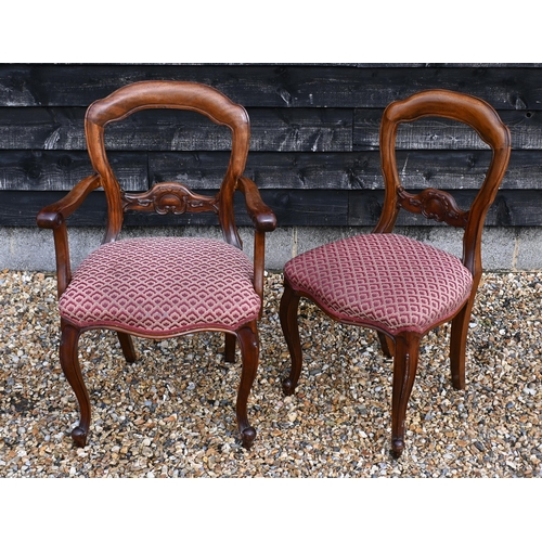 148 - A set of eight walnut framed dining chairs, the overstuffed fabric seats on cabriole front legs, 6 s... 