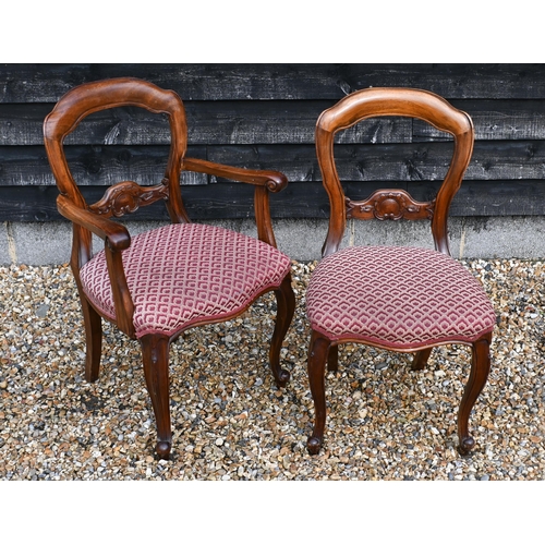 148 - A set of eight walnut framed dining chairs, the overstuffed fabric seats on cabriole front legs, 6 s... 