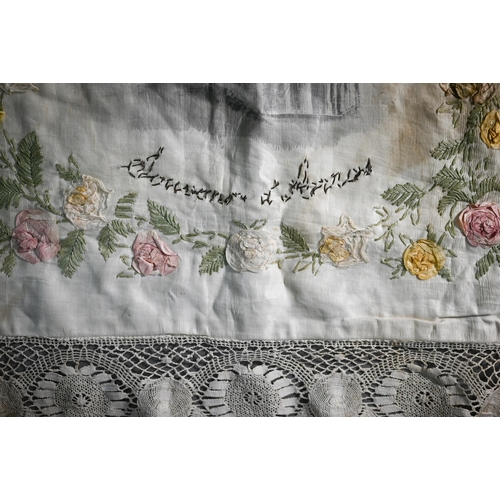 290 - A World War I North France souvenir silk shawl, with crochet edging and applied roses and featuring ... 