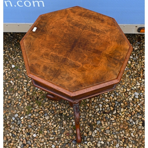 58 - A Victorian walnut octagonal sewing table, raise on a tripod base, 44 cm diameter x 75 cm h