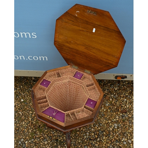 58 - A Victorian walnut octagonal sewing table, raise on a tripod base, 44 cm diameter x 75 cm h