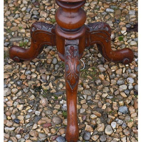 58 - A Victorian walnut octagonal sewing table, raise on a tripod base, 44 cm diameter x 75 cm h