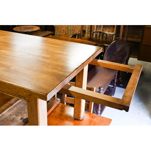 224 - Fired earth, an oak block top kitchen table, 148 cm x 90 cm x 78 cm h to/w a conforming set of eight... 