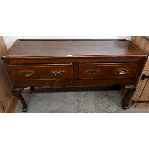 103 - A Georgian oak and box-wood strung low dresser with two drawers and shaped supports 136 cm w x 44 cm... 