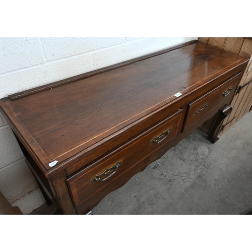 103 - A Georgian oak and box-wood strung low dresser with two drawers and shaped supports 136 cm w x 44 cm... 