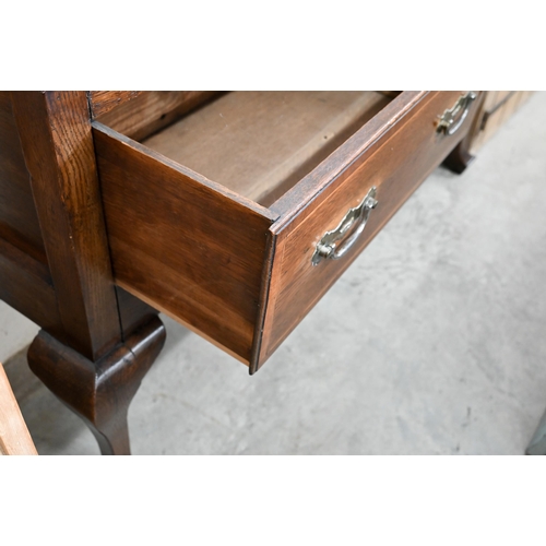 103 - A Georgian oak and box-wood strung low dresser with two drawers and shaped supports 136 cm w x 44 cm... 