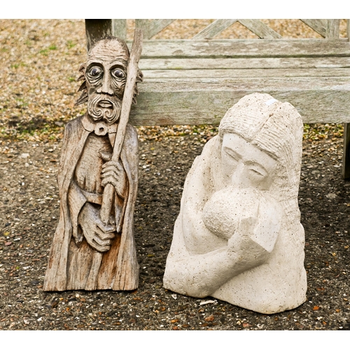 11 - # A cast stone garden statue of a mother and child to/with a carved wooden figural plaque (2)