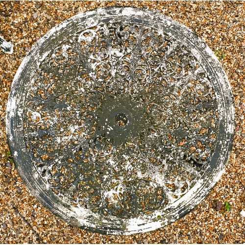 12 - A circular Victorian style cast metal terrace table to/with two matching chairs, old distressed pain... 