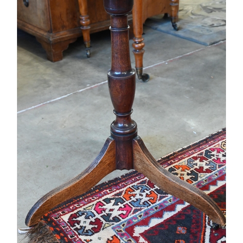 122 - A 19th century mahogany occasional table with square tilt-top on turned column and triform supports ... 