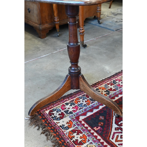 122 - A 19th century mahogany occasional table with square tilt-top on turned column and triform supports ... 