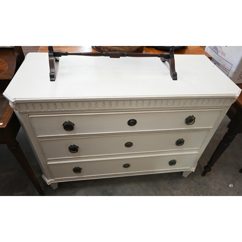 130 - A painted Chelsea Design Company chest of three long drawers with fluted mouldings and supports, 112... 