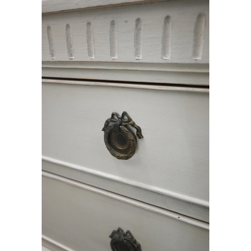 130 - A painted Chelsea Design Company chest of three long drawers with fluted mouldings and supports, 112... 