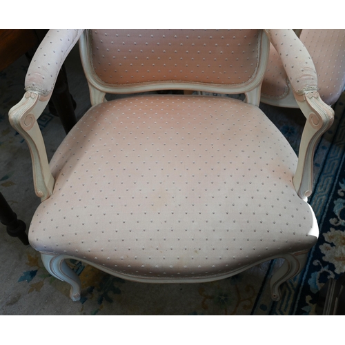 131 - A pair of French painted fauteuil open armchairs with patterned pink fabric