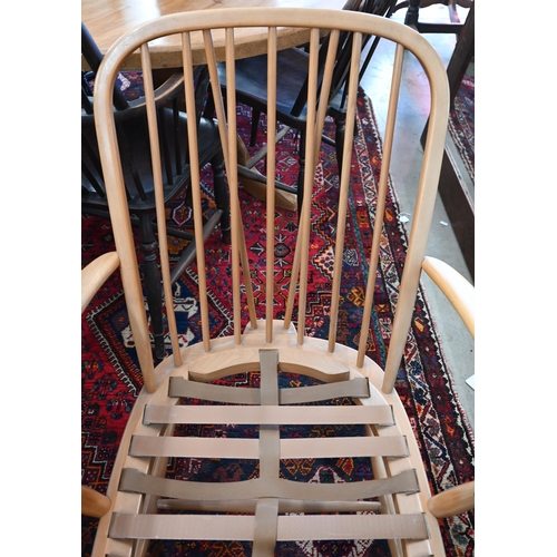 138 - Three mid century Ercol (blue label) beech framed 'Windsor' easy chairs with floral back and seat cu... 