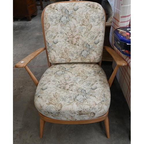 138 - Three mid century Ercol (blue label) beech framed 'Windsor' easy chairs with floral back and seat cu... 