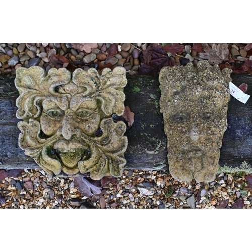 14 - Four assorted cast stone garden 'Green man' wall mask plaques (4)